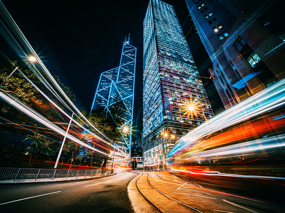 Bank of China Tower and Cheong Kong Center at night.